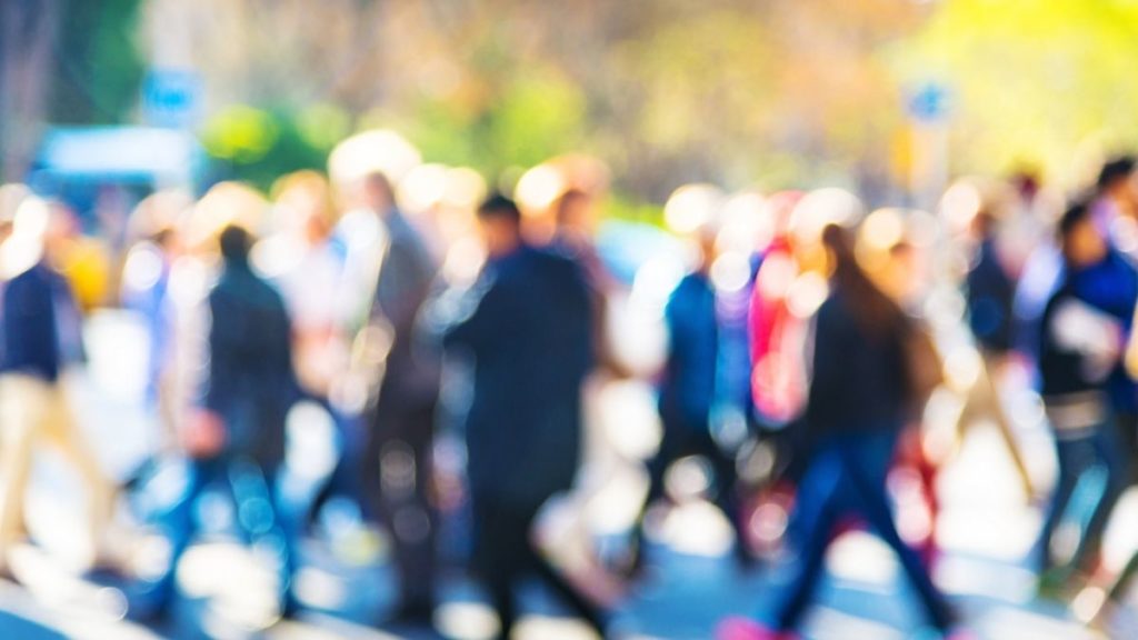 Image of a crowd of people walking