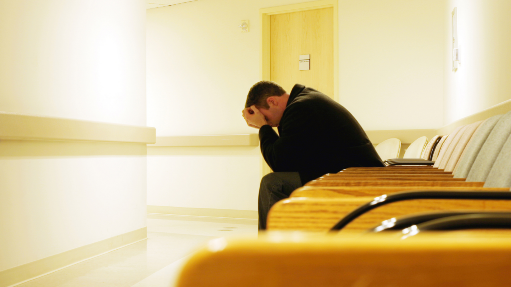 Man in waiting area